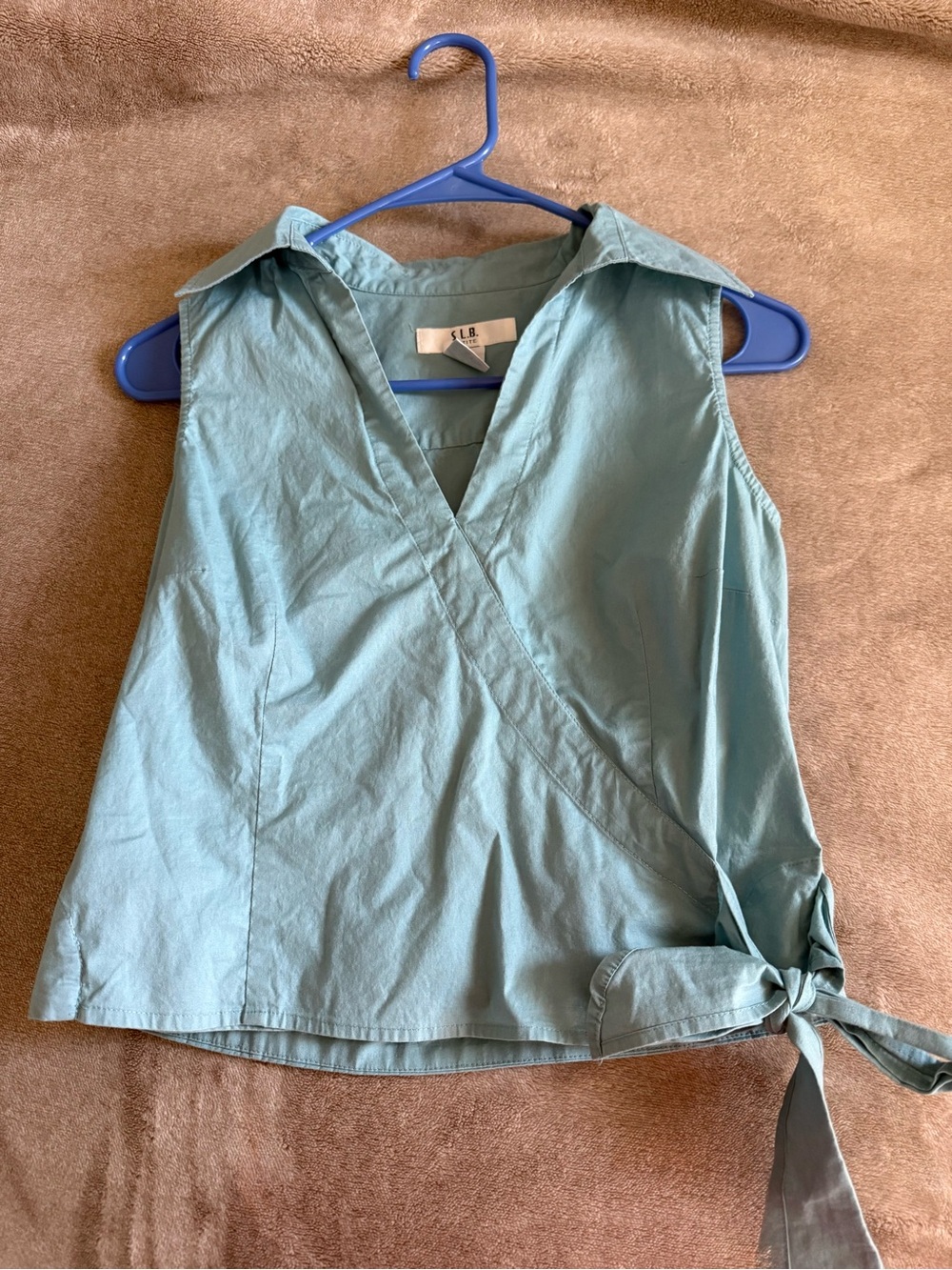 Light Blue Sleeveless Wrap Top